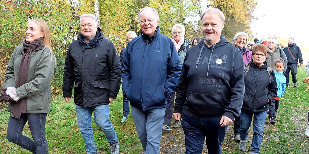 Former prime minister hikes through the forest near Diekholzen.